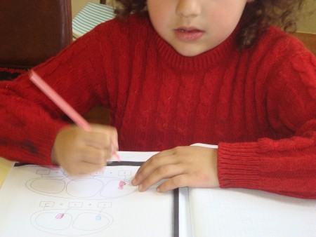 A realizar uma ficha de matemática